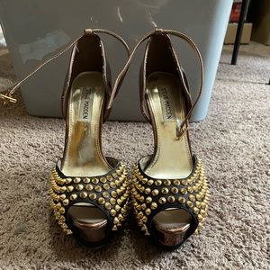 Gold and black heels